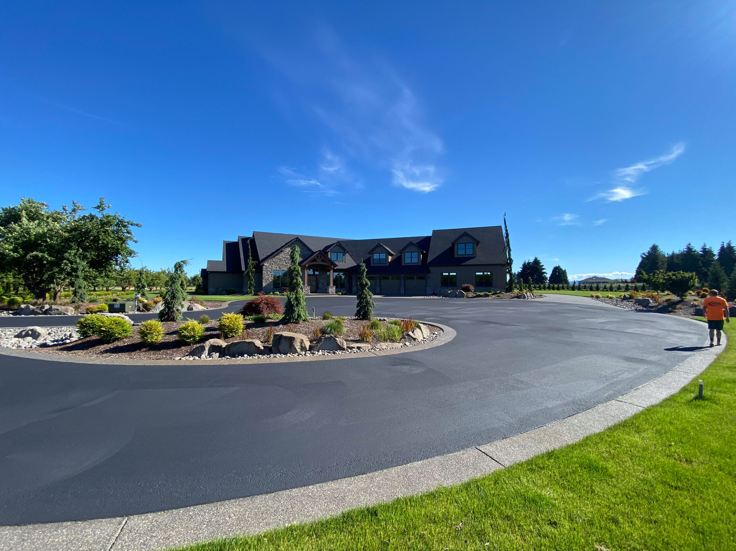 A beautiful home isn't complete without a smooth driveway to match. Smooth your driveway today with Benson Asphalt Maintenance.